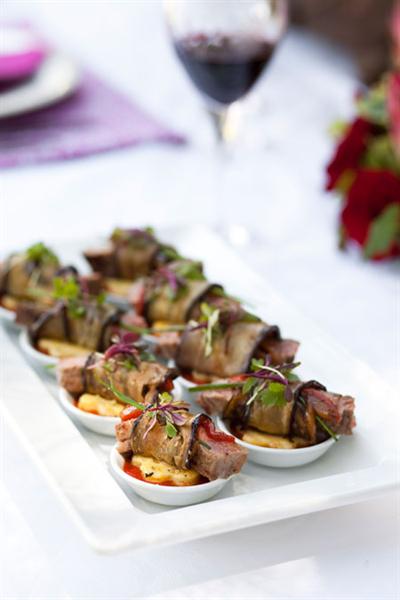POLENTA CAKES WITH STEAK AND MARINATED PEPPERS