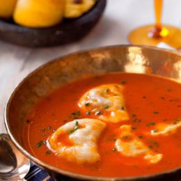 SPICED TOMATO BROTH WITH LAMB DUMPLINGS