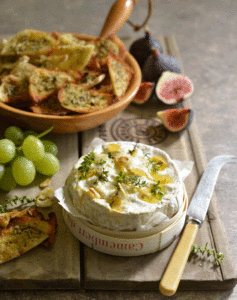 GARLIC AND THYME-STUFFED CAMEMBERT WITH HERBED PITA TOASTS