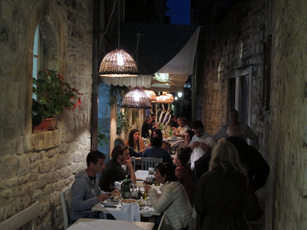 Alfresco dining between ancient walls. - exploring croatia