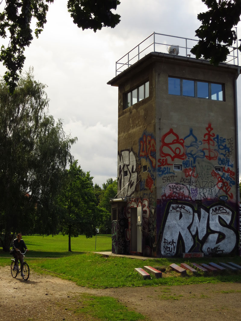 A former guard tower overlooking what was no man’s land beside the Berlin wall serves as a reminder of history. 