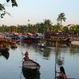 IN THE EVENINGS, HOI AN COMES TO LIFE WITH FOOD STALLS AND BOATS ON THE RIVER.