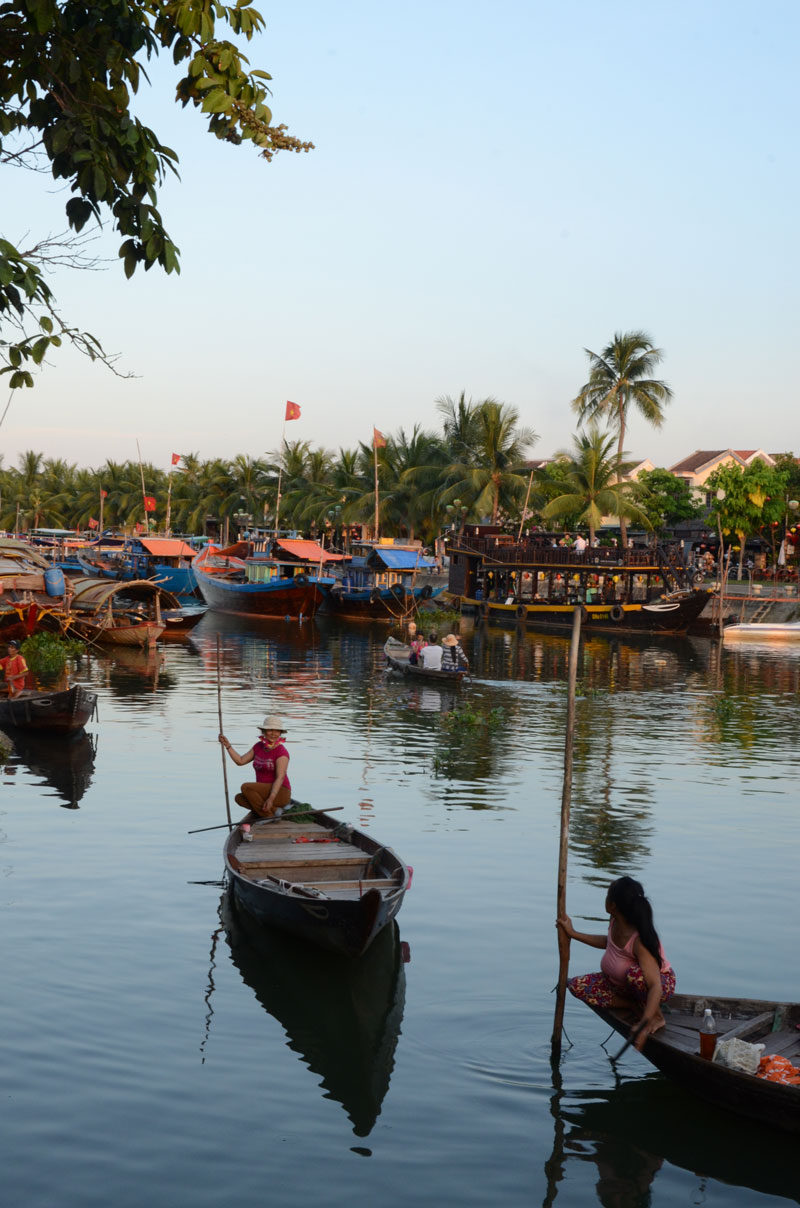 IN THE EVENINGS, HOI AN COMES TO LIFE WITH FOOD STALLS AND BOATS ON THE RIVER.