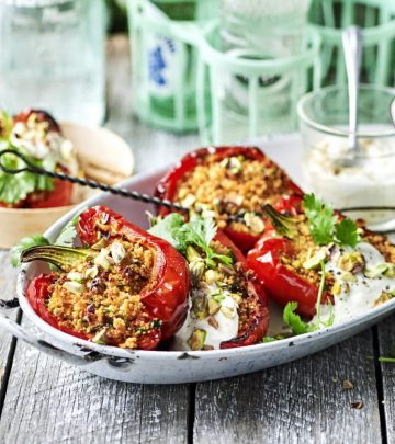 Peppers stuffed with pistachio-harissa couscous