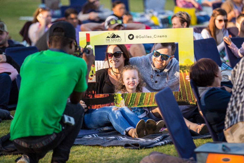 Family taking a picture at the Galileo Open Cinema