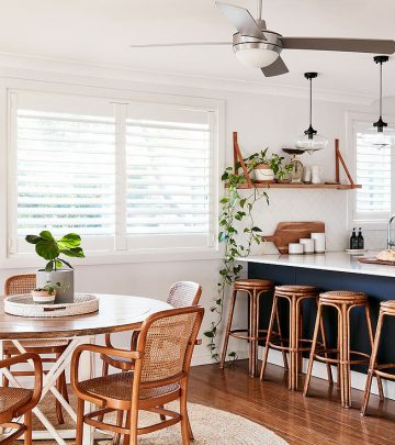 Round table and chairs next to kitchen counter