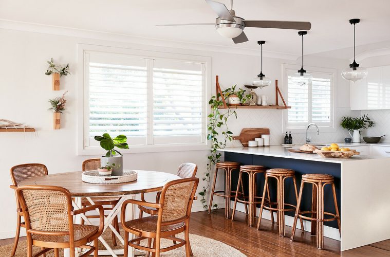 Round table and chairs next to kitchen counter