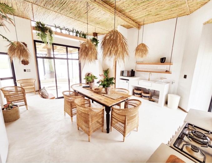 kitchen and dining area inside Thailand-inspired holiday home