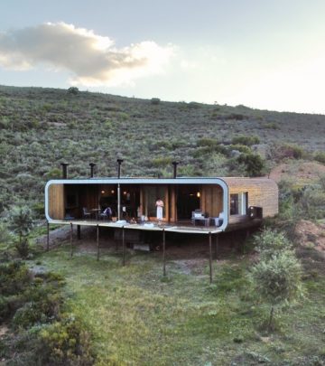 an eco pod in the middle of an open bush