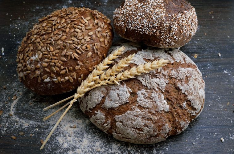 three freshly baked loaves of bread