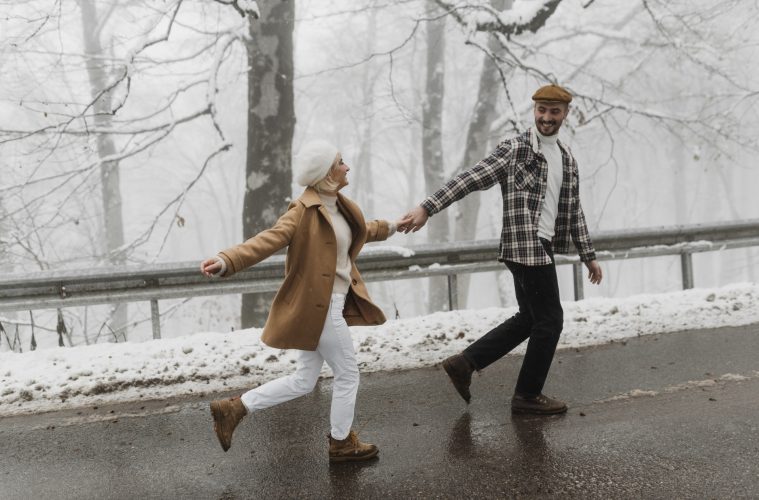 Happy couple holding hands