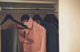 A closet with clothes