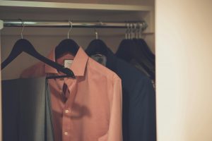 A closet with clothes