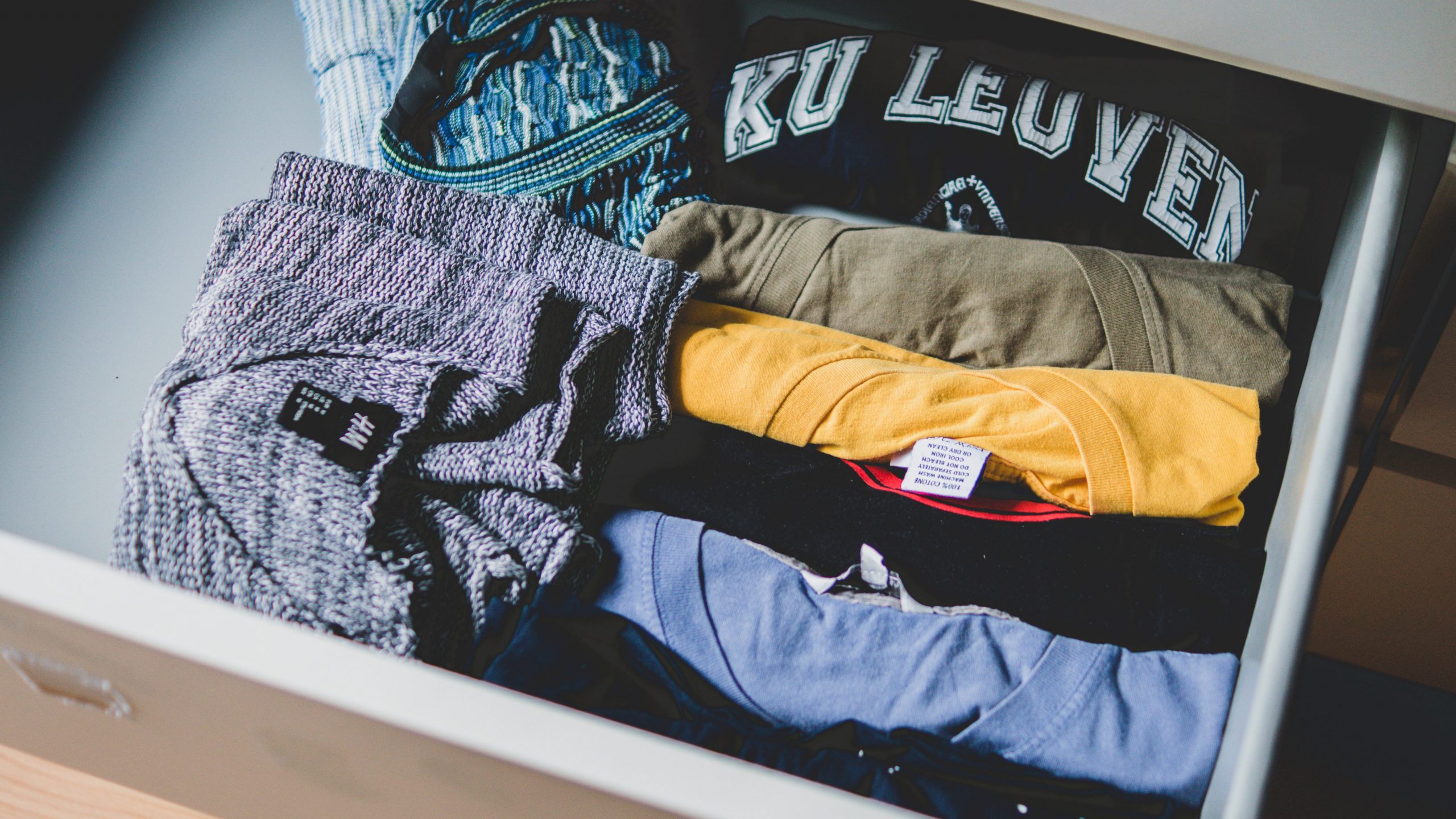 A drawer with clothes