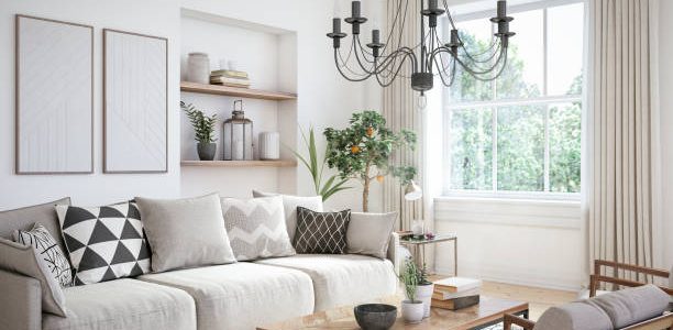 Apartment living room with beige colored furniture and wooden elements