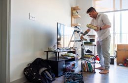 Unpacking and making a house a home by putting books in their places