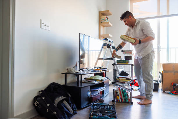 Unpacking and making a house a home by putting books in their places