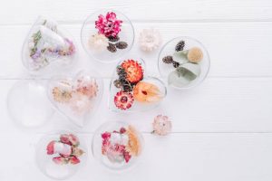 DIY ornaments filled with dried flowers waiting for resin