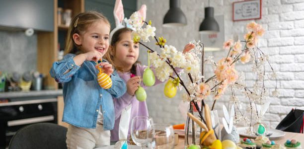 sisters decorating the dining table for an Easter lunch