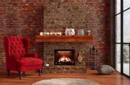 Chalet Interior With Fireplace and red chair