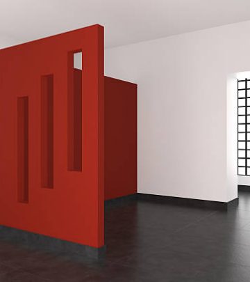 modern empty interior with red wall and window