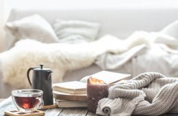 Home comfort in the living room with a Cup of tea and a kettle