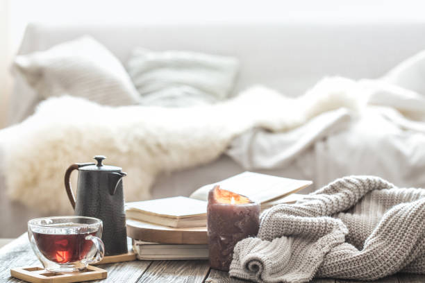 Home comfort in the living room with a Cup of tea and a kettle