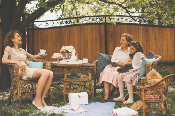 Three generations of ladies enjoying Mother's day tea party 