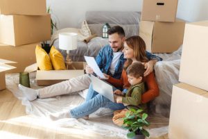 Happy family enjoying their new apartment.