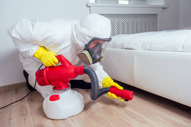 pest control worker lying on floor